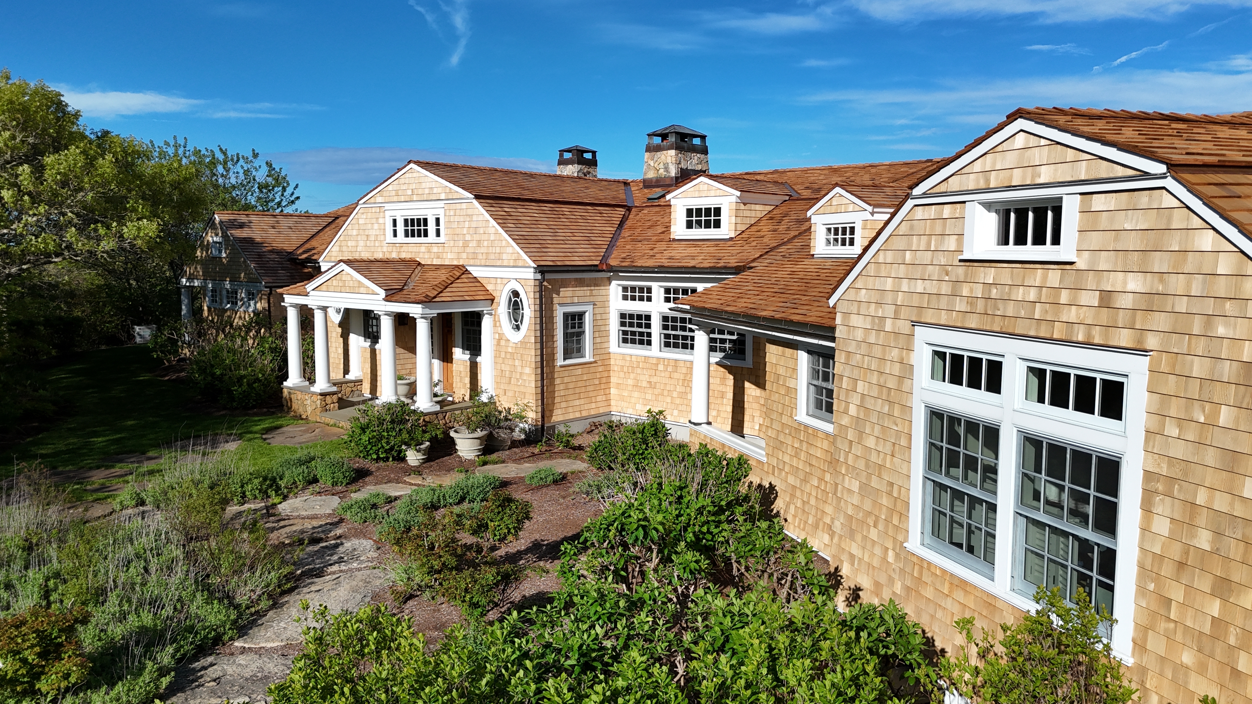 Roof Replacement vs. Roof Overlay: Which Is Better for South Shore Homes?